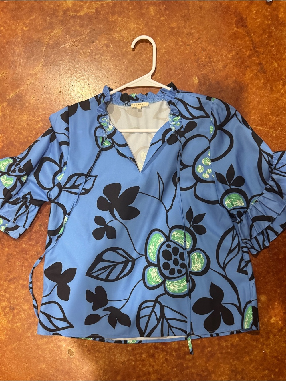 JODIFL Blue Floral Tie-Neck Blouse with Green Accents